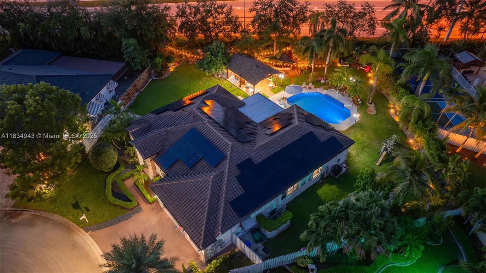 14501 Southwest 33rd Court Miramar, FL 33027 - Photo 90 of 91 an aerial view of a house with a yard