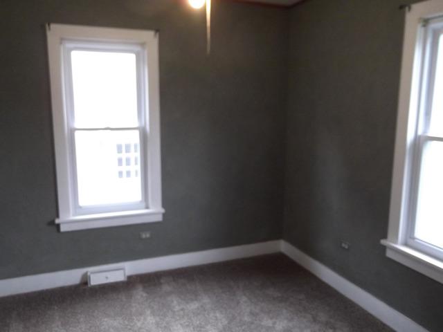 404 West Minnesota Street Spring Valley, IL 61362 - Photo 11 of 19 an empty room with a window