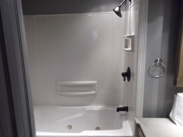 404 West Minnesota Street Spring Valley, IL 61362 - Photo 12 of 19 a bathroom with a bathtub and toilet