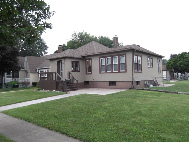 404 West Minnesota Street Spring Valley, IL 61362 - Photo 19 of 19 a front view of a house with a yard and trees