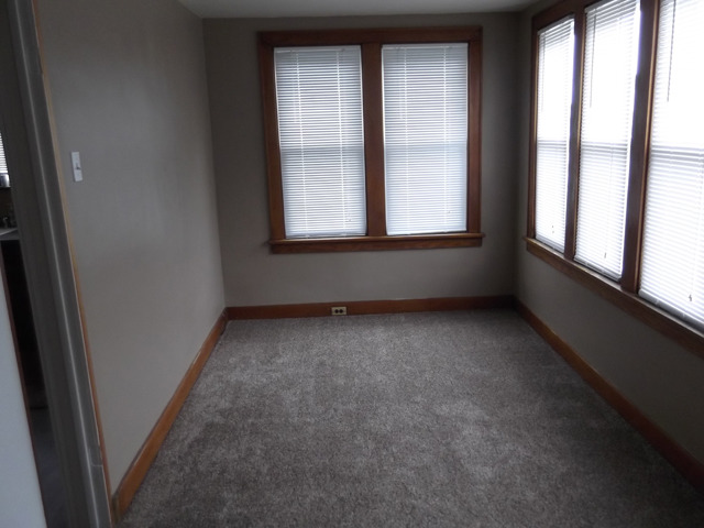 404 West Minnesota Street Spring Valley, IL 61362 - Photo 3 of 19 an empty room with a window