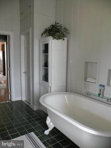 3771 Point Of Rocks Road Jefferson, MD 21755 - Photo 11 of 30 a bathroom with a bathtub and a sink