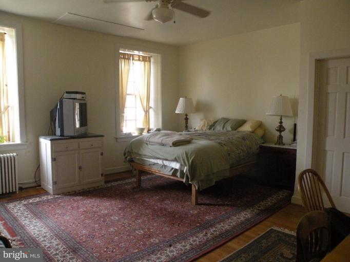 3771 Point Of Rocks Road Jefferson, MD 21755 - Photo 12 of 30 a bedroom with a bed and a window