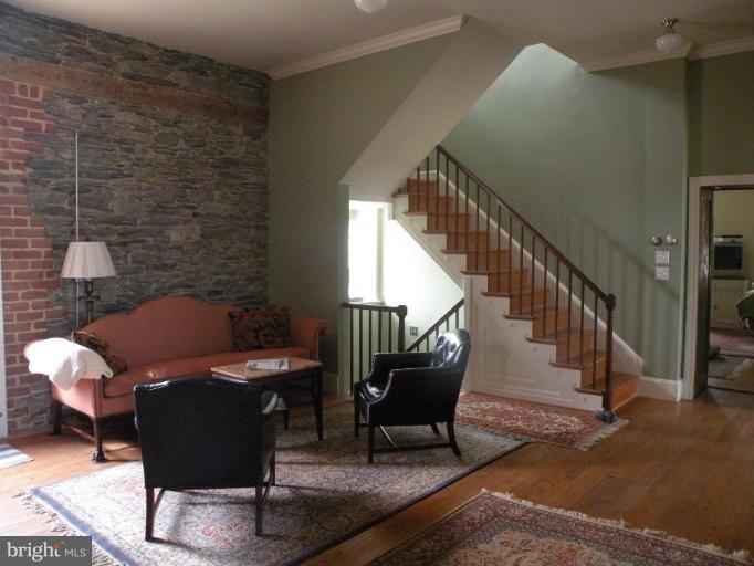 3771 Point Of Rocks Road Jefferson, MD 21755 - Photo 5 of 30 a living room with furniture and a rug