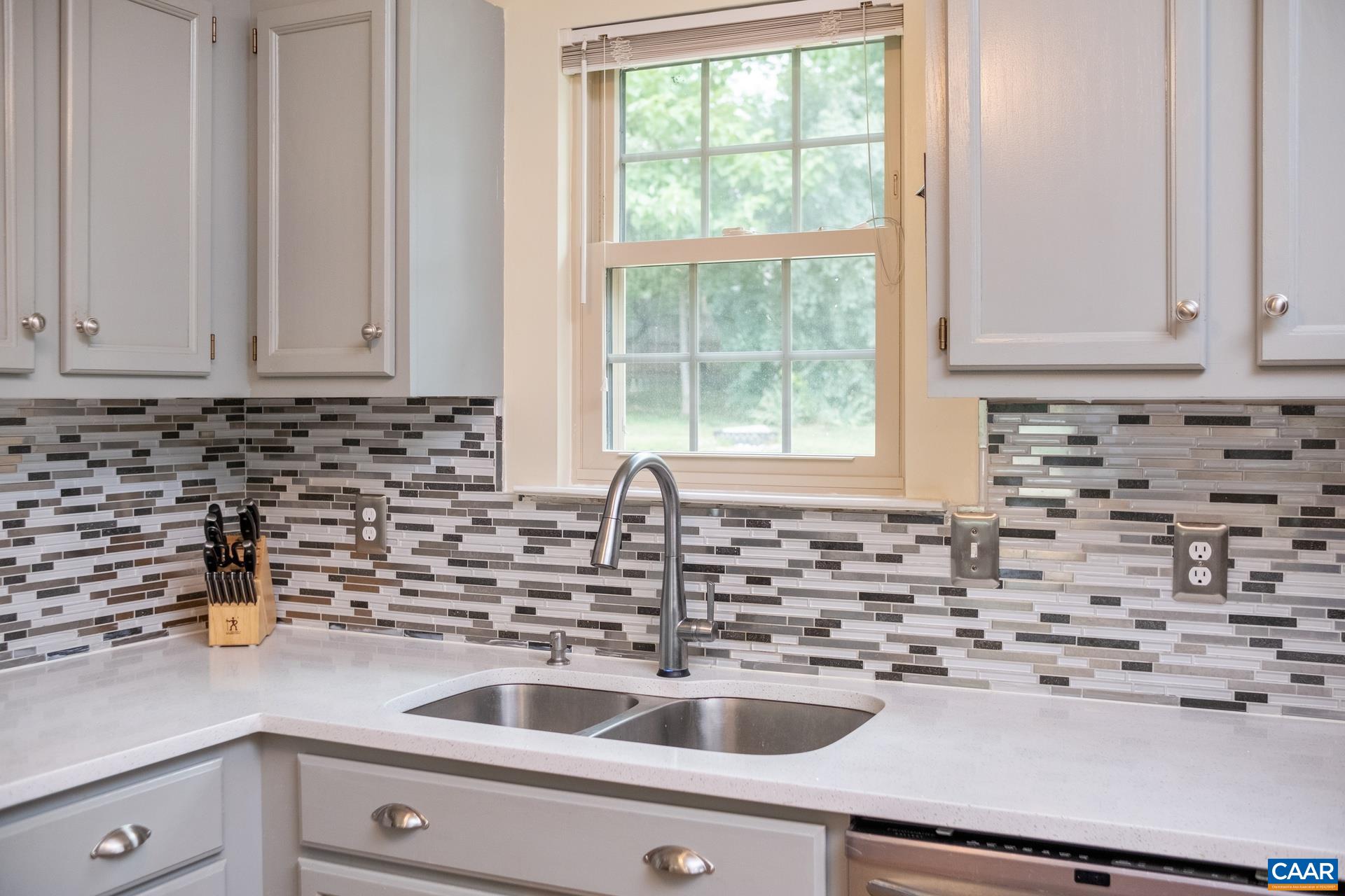 17 Jonquil Road Ruckersville, VA 22968 - Photo 12 of 33 a kitchen with a sink and cabinets