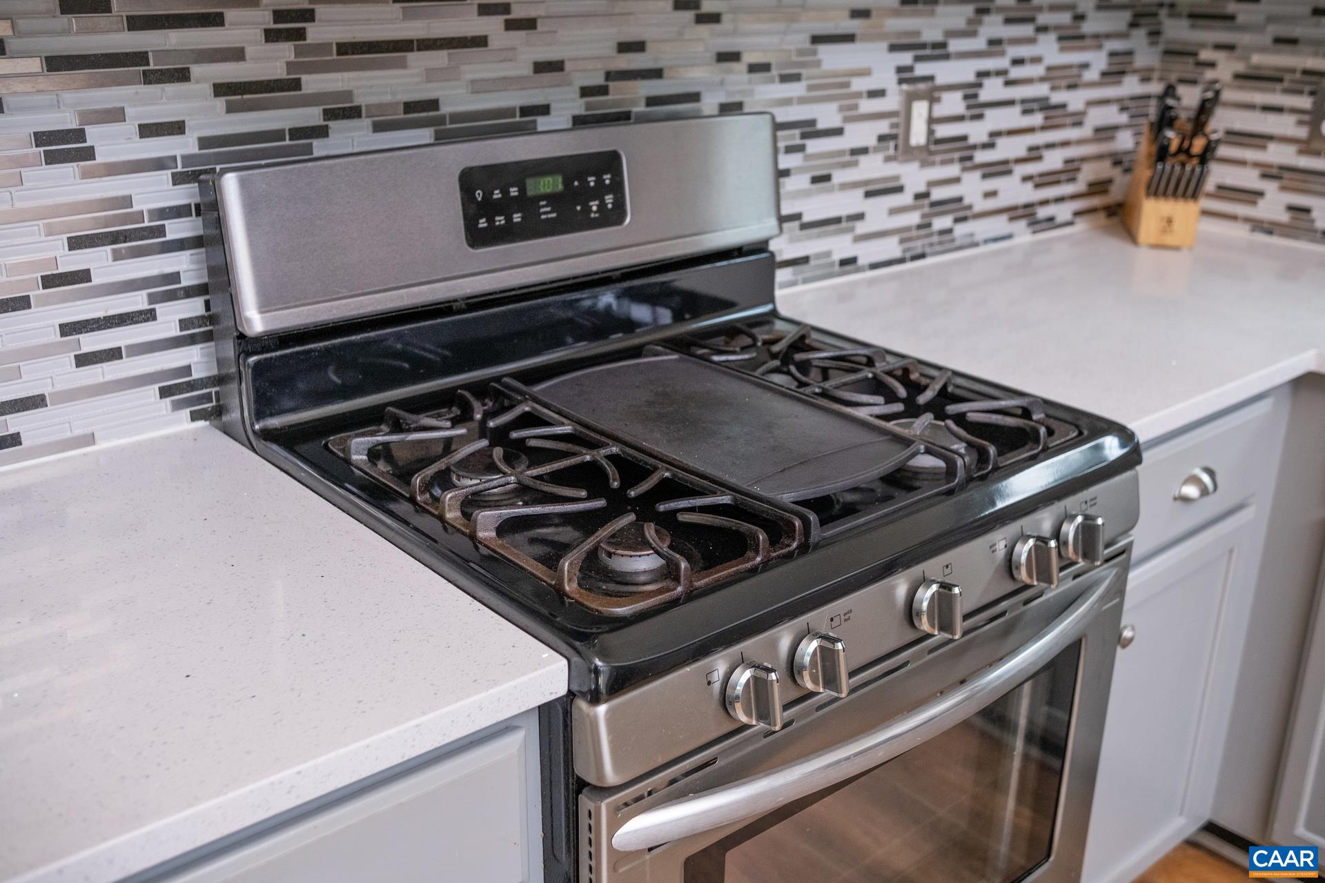 17 Jonquil Road Ruckersville, VA 22968 - Photo 13 of 33 a close up of a stove top oven sitting inside of a kitchen