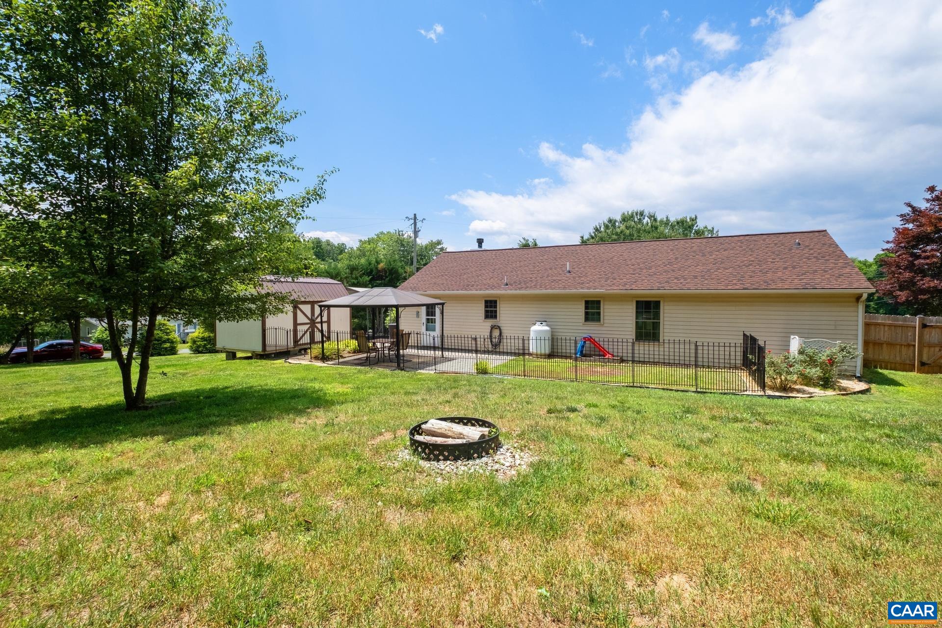 17 Jonquil Road Ruckersville, VA 22968 - Photo 28 of 33 a front view of a house with garden