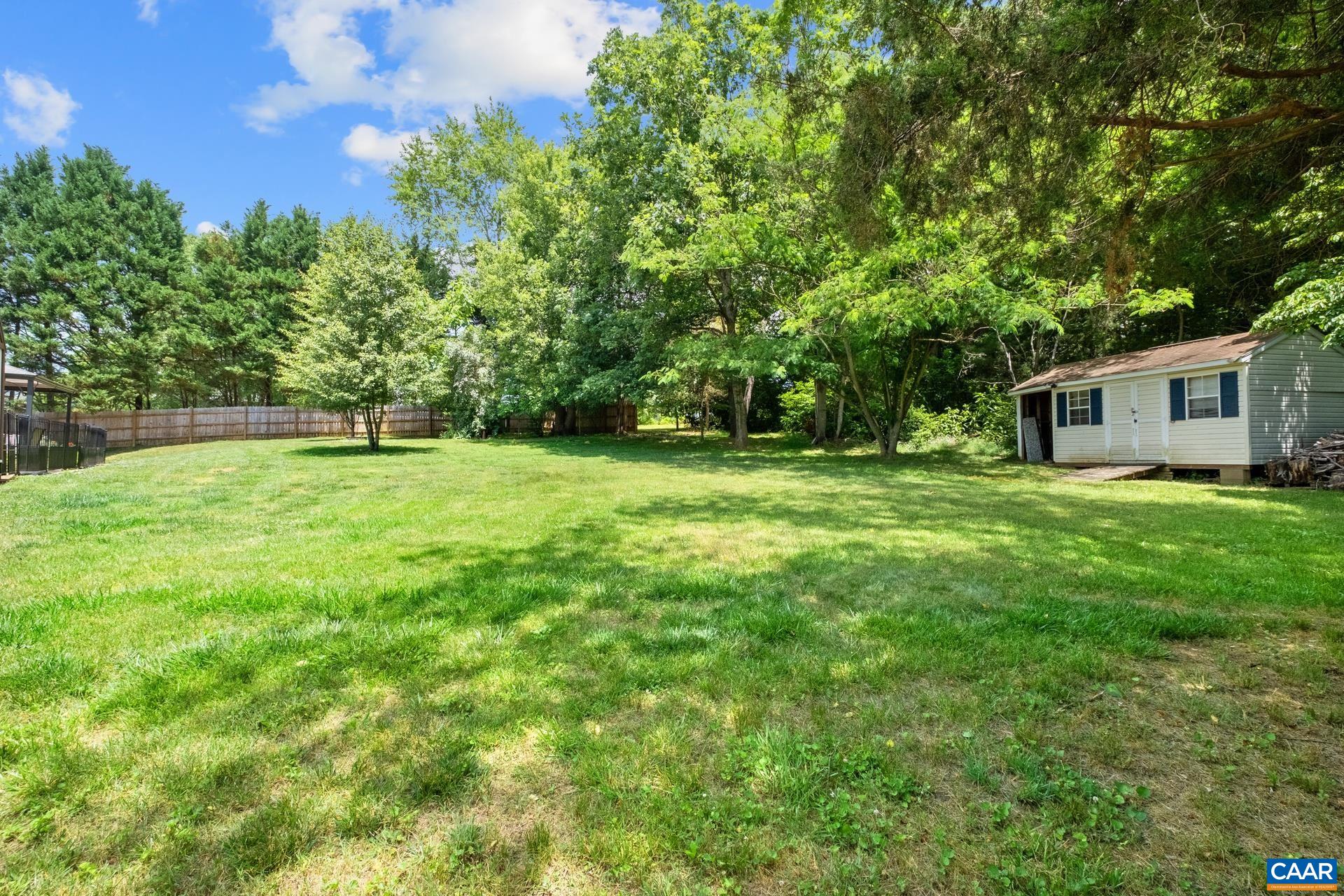 17 Jonquil Road Ruckersville, VA 22968 - Photo 30 of 33 a view of a backyard with a garden
