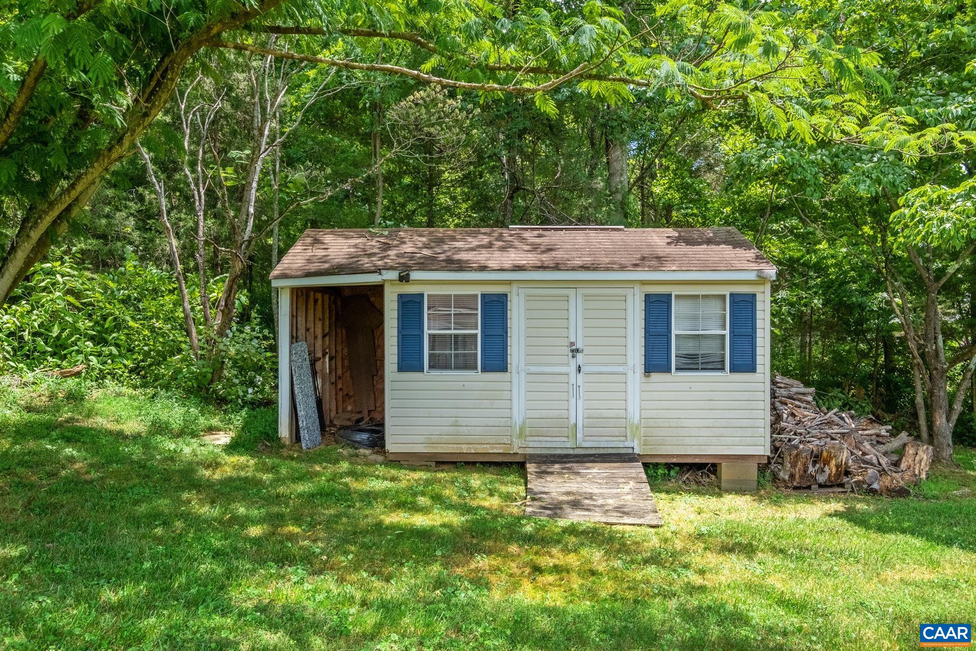17 Jonquil Road Ruckersville, VA 22968 - Photo 31 of 33 front view of a house with a yard