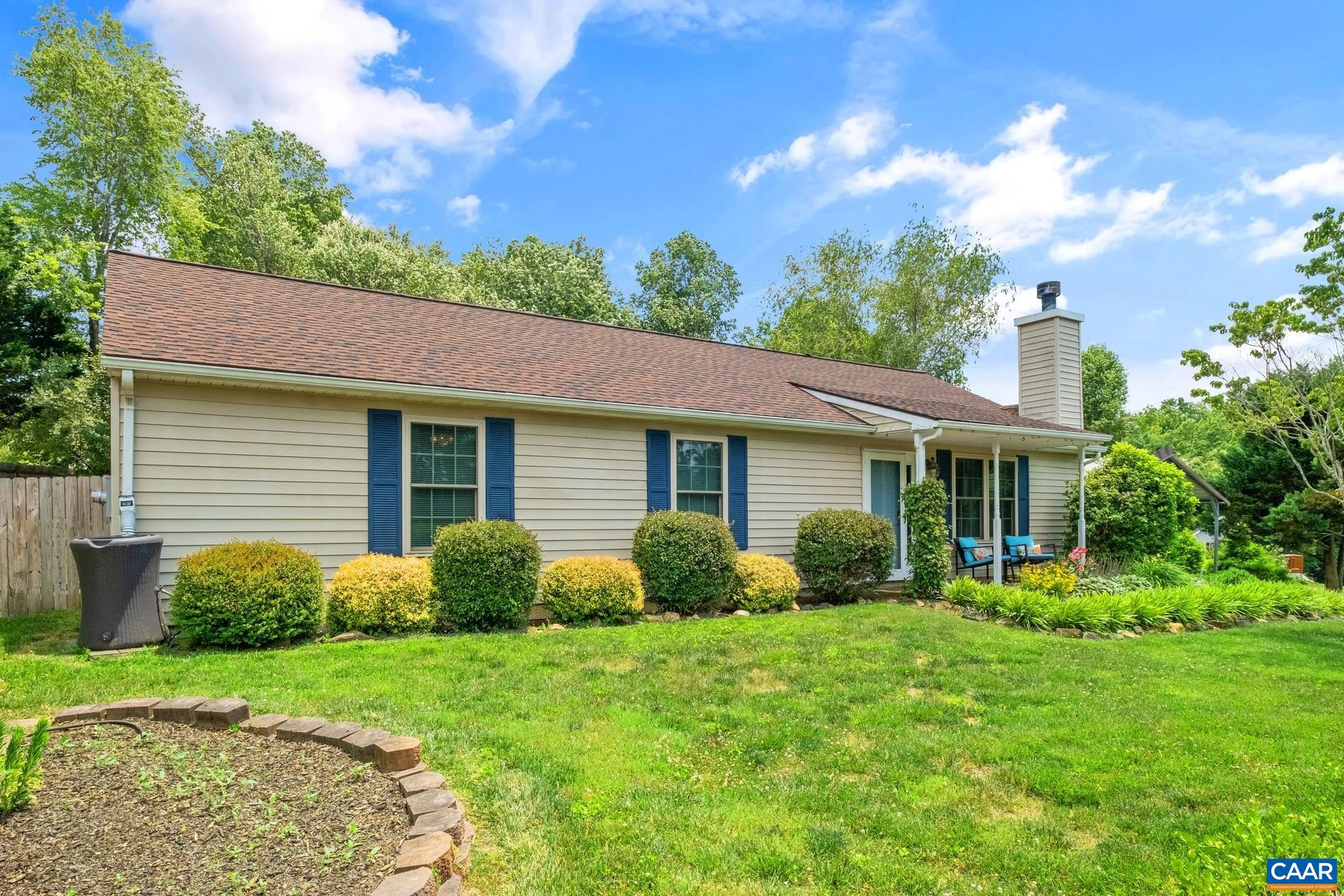 17 Jonquil Road Ruckersville, VA 22968 - Photo 32 of 33 a view of a house with a yard and plants