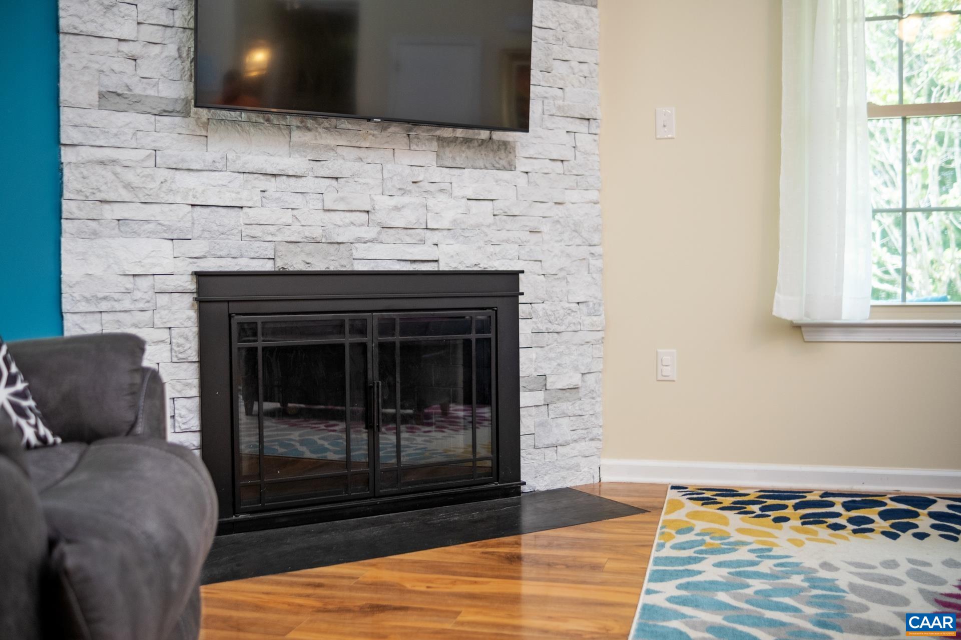 17 Jonquil Road Ruckersville, VA 22968 - Photo 8 of 33 a living room with furniture and a fireplace