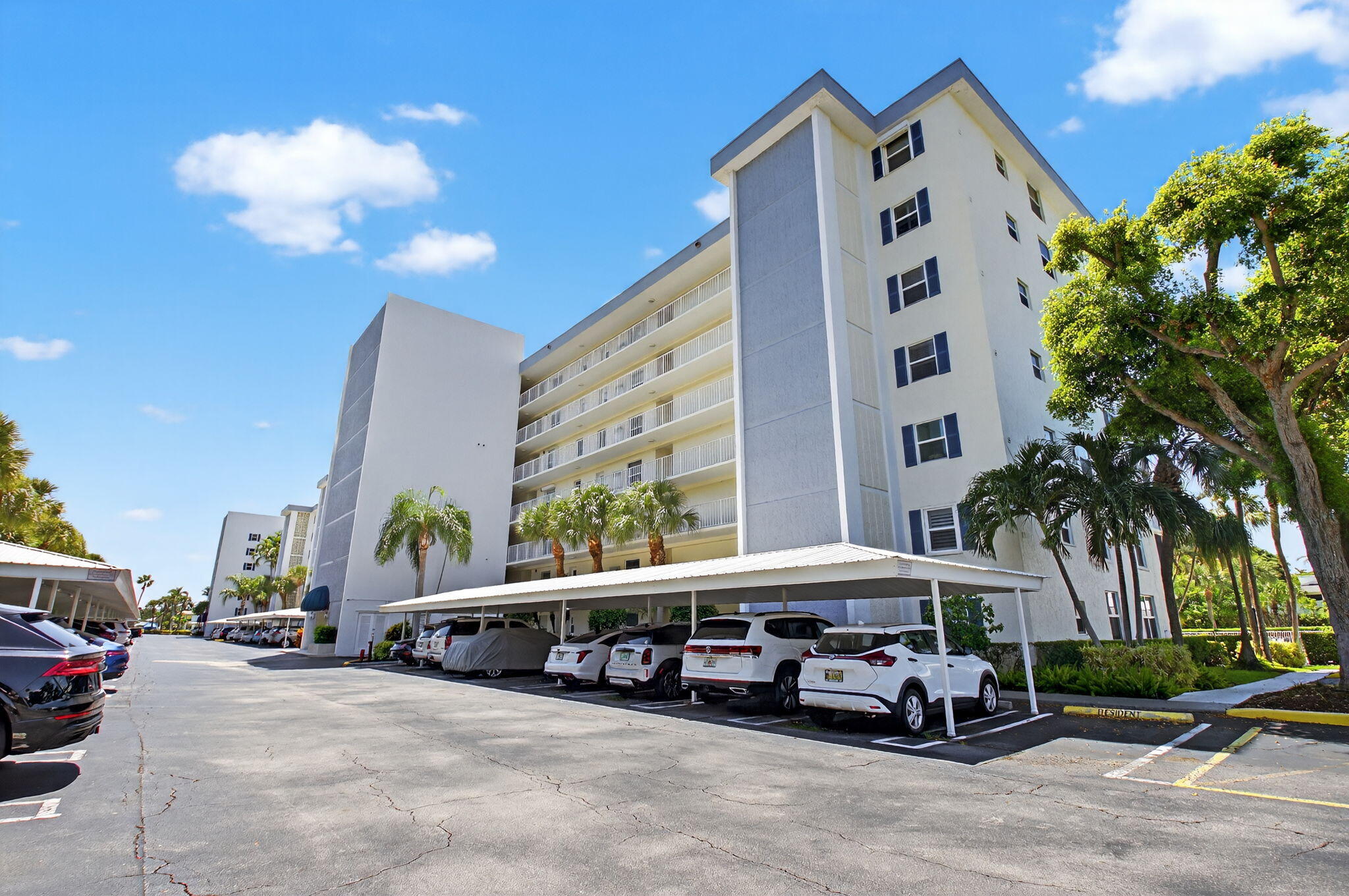 1 Harbourside Drive, Unit 4205 Delray Beach, FL 33483 - Photo 3 of 97 a view of street with parked cars