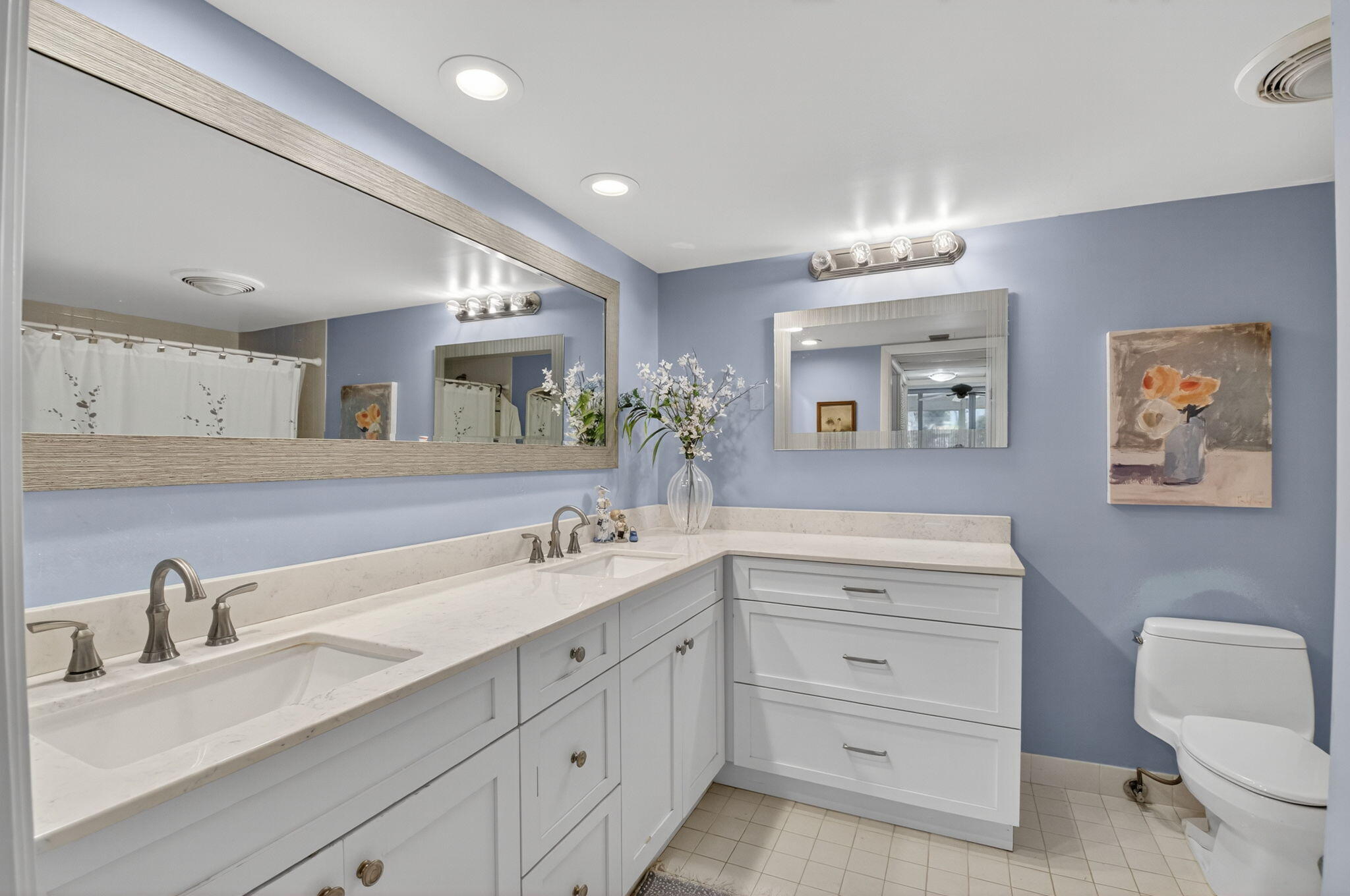 1 Harbourside Drive, Unit 4205 Delray Beach, FL 33483 - Photo 31 of 97 a spacious bathroom with a double vanity sink and a mirror