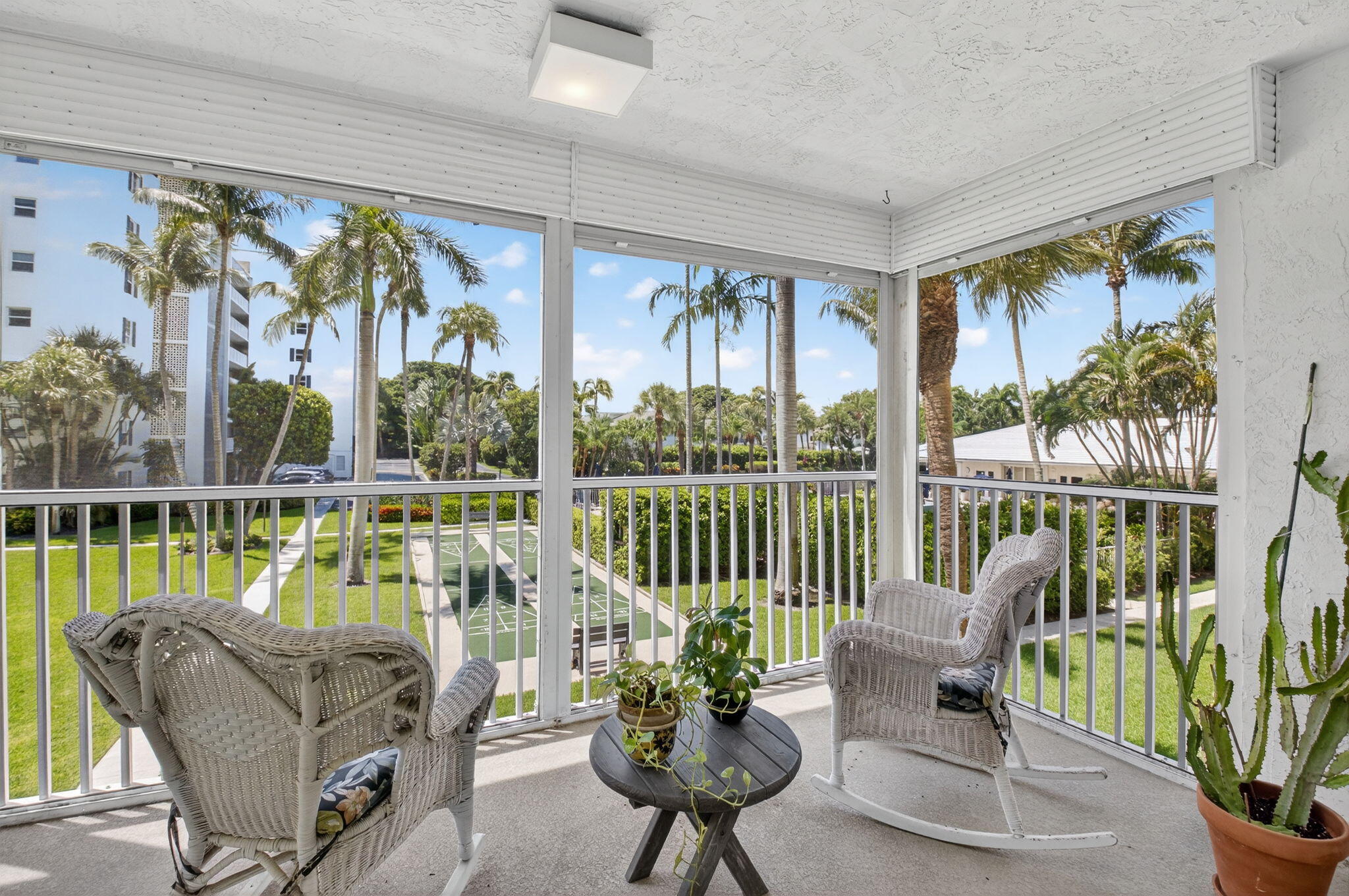 1 Harbourside Drive, Unit 4205 Delray Beach, FL 33483 - Photo 35 of 97 a living room with furniture and a potted plant