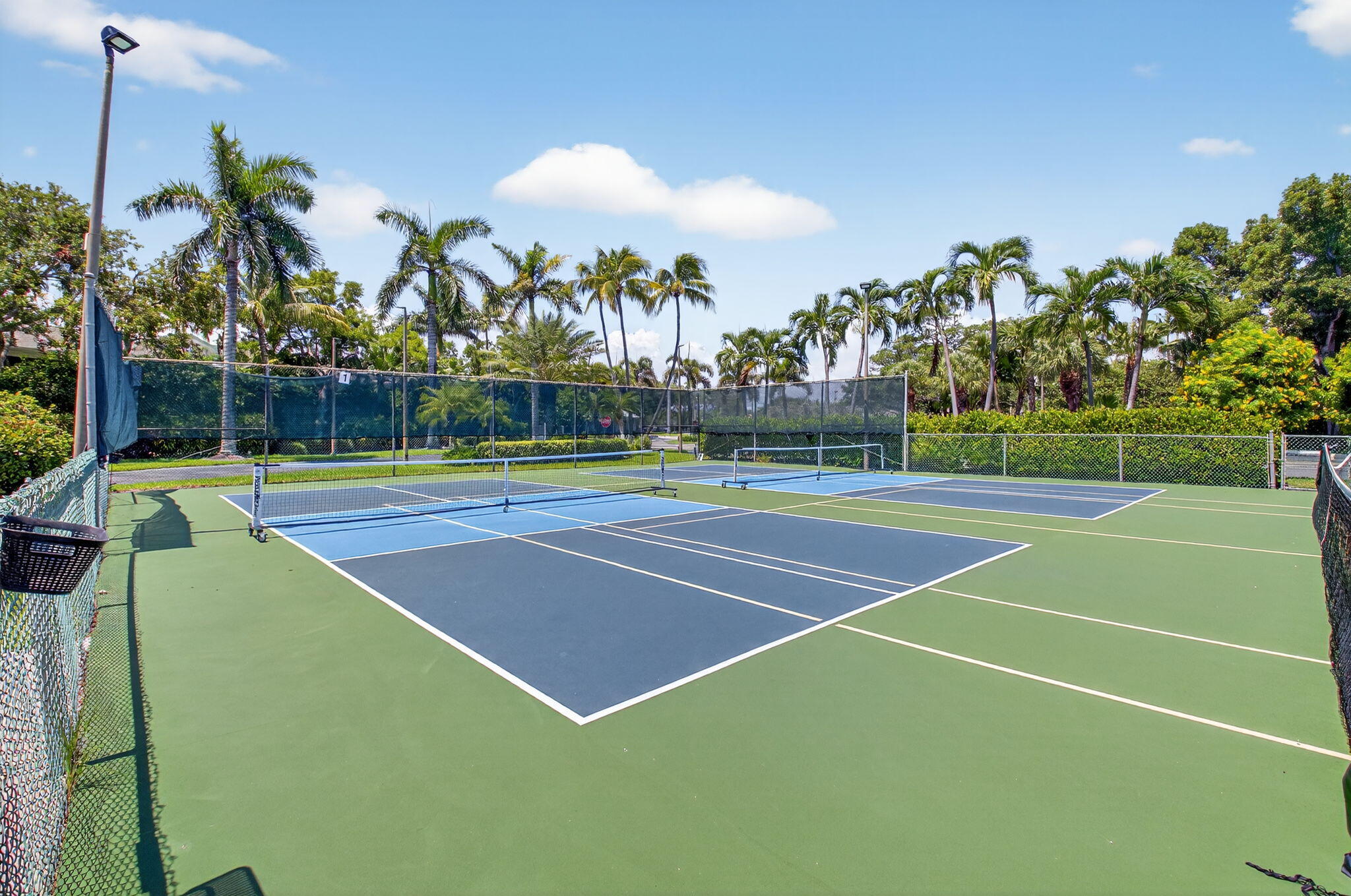 1 Harbourside Drive, Unit 4205 Delray Beach, FL 33483 - Photo 42 of 97 a view of an outdoor space and tennis court