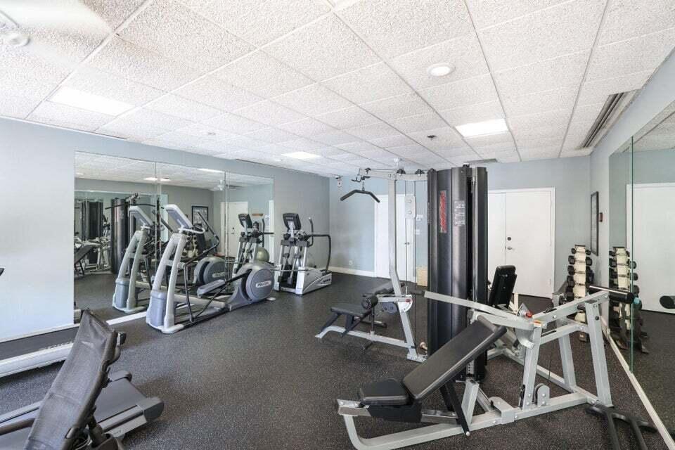 1 Harbourside Drive, Unit 4205 Delray Beach, FL 33483 - Photo 68 of 97 a view of a room with gym equipment
