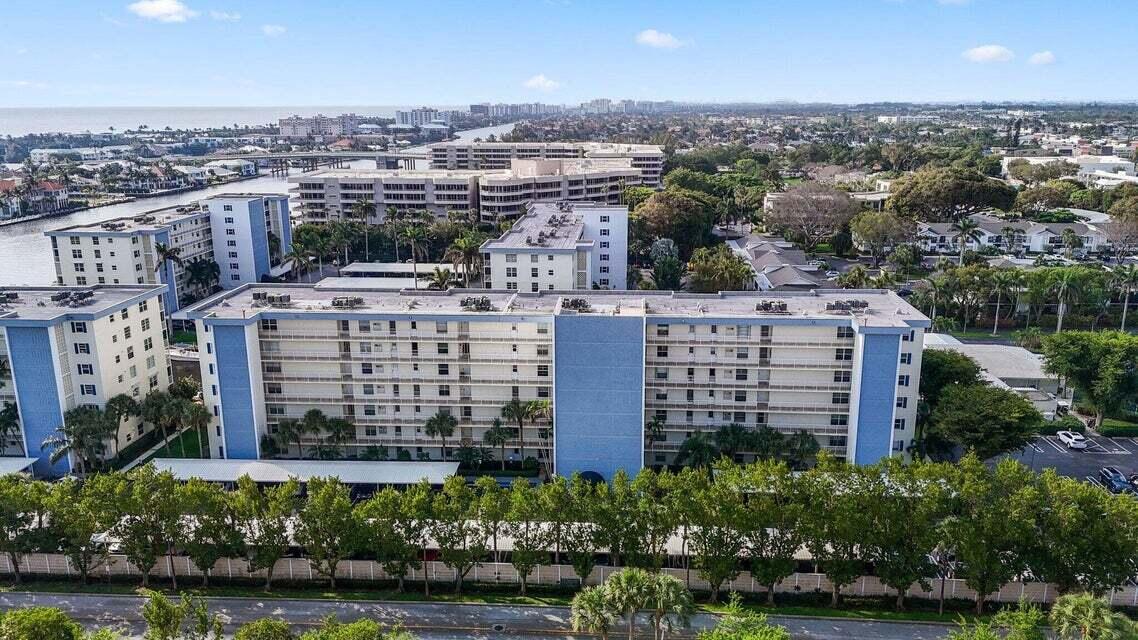 1 Harbourside Drive, Unit 4205 Delray Beach, FL 33483 - Photo 87 of 97 an aerial view of a multi story building with yard