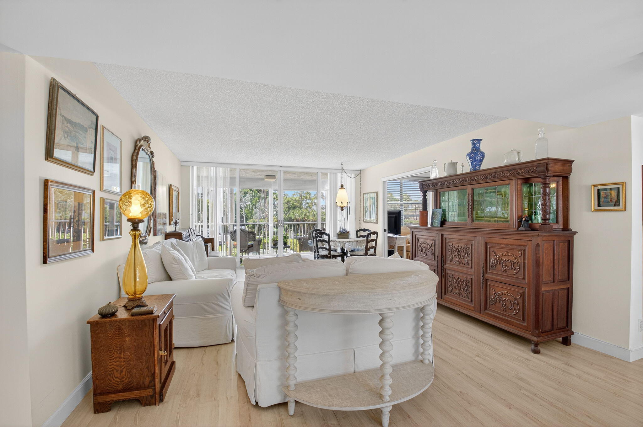 1 Harbourside Drive, Unit 4205 Delray Beach, FL 33483 - Photo 9 of 97 a living room with furniture a fireplace and a flat screen tv