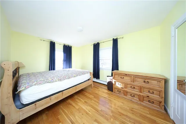 a bedroom with a workspace