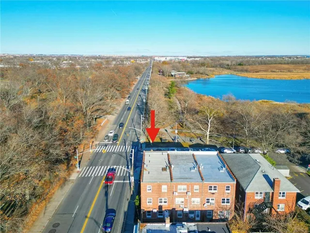 a view of a city with an ocean view