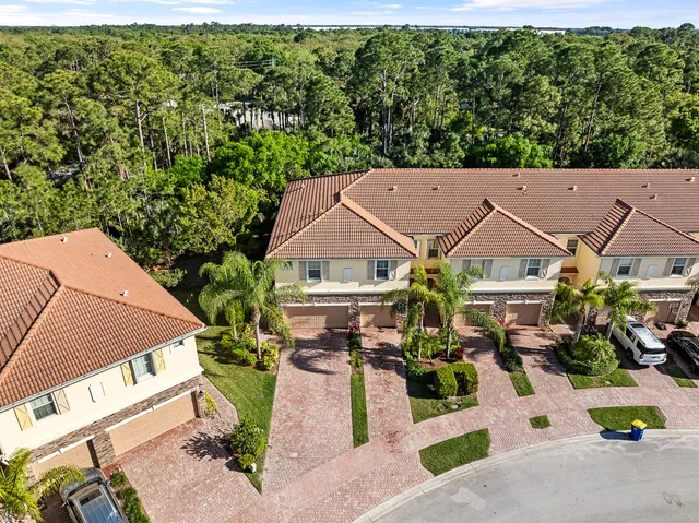 an aerial view of a house with garden