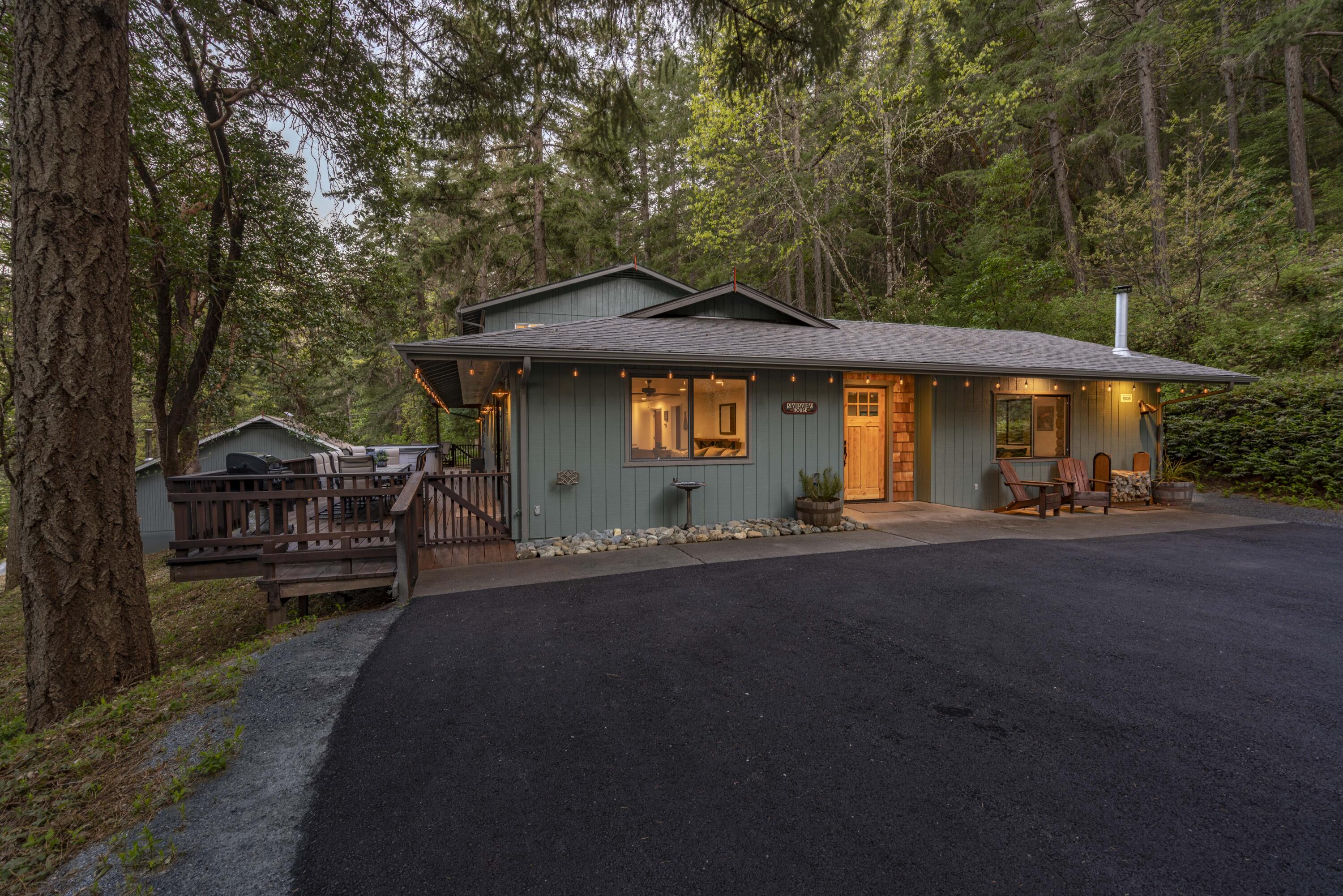 11744 Galice Road Merlin, OR 97532 - Photo 45 of 74 a front view of a house with a garden