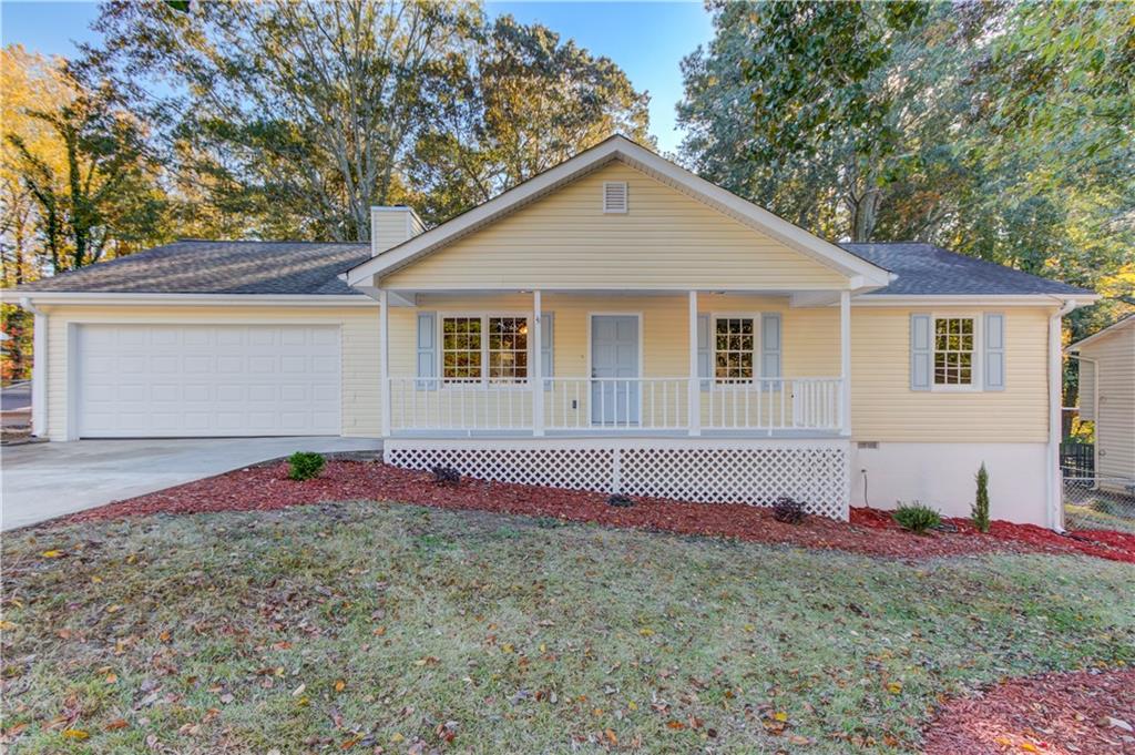 1983 Anchor Way Buford, GA 30518 - Photo 1 of 1 a front view of a house with a yard