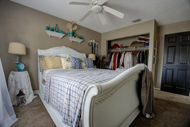 an aerial view of a house with outdoor space