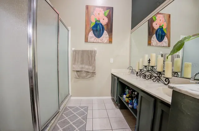 a view of a yard with plants and a garden