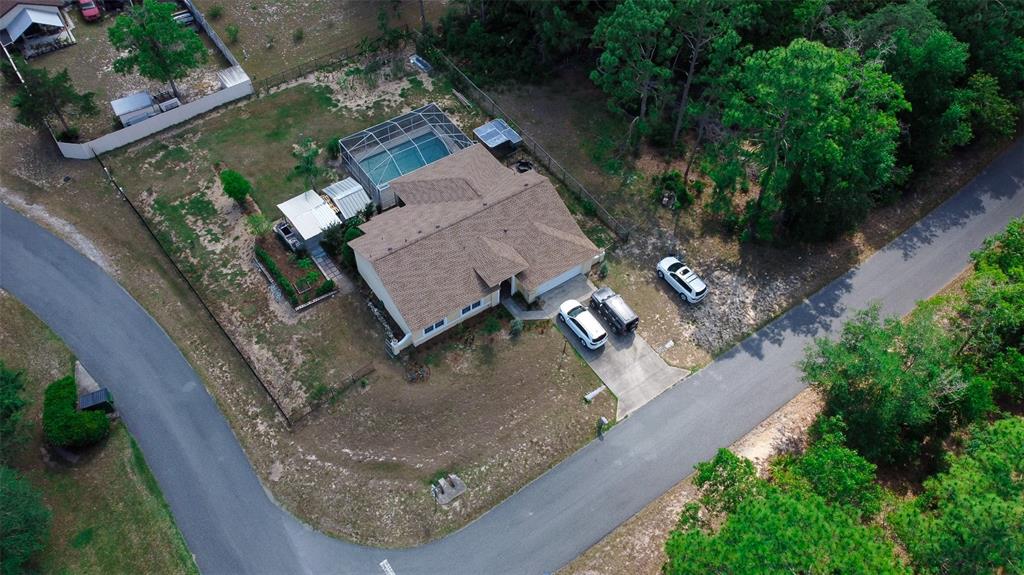567 Silver Course Run Ocala, FL 34472 - Photo 36 of 95 an aerial view of a house having outdoor space
