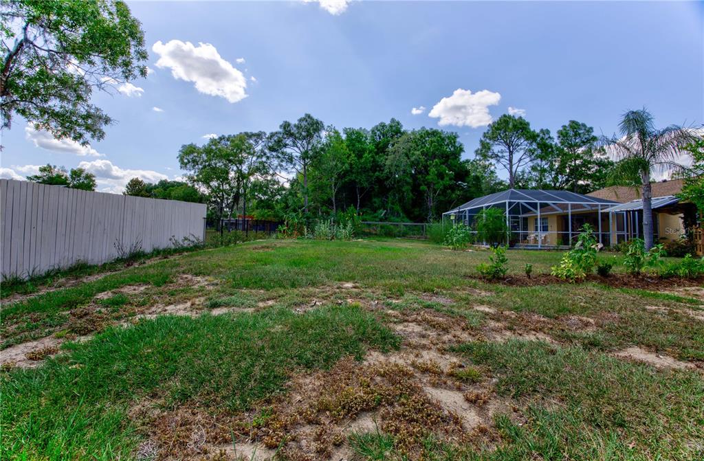 567 Silver Course Run Ocala, FL 34472 - Photo 56 of 95 a front view of a house with garden
