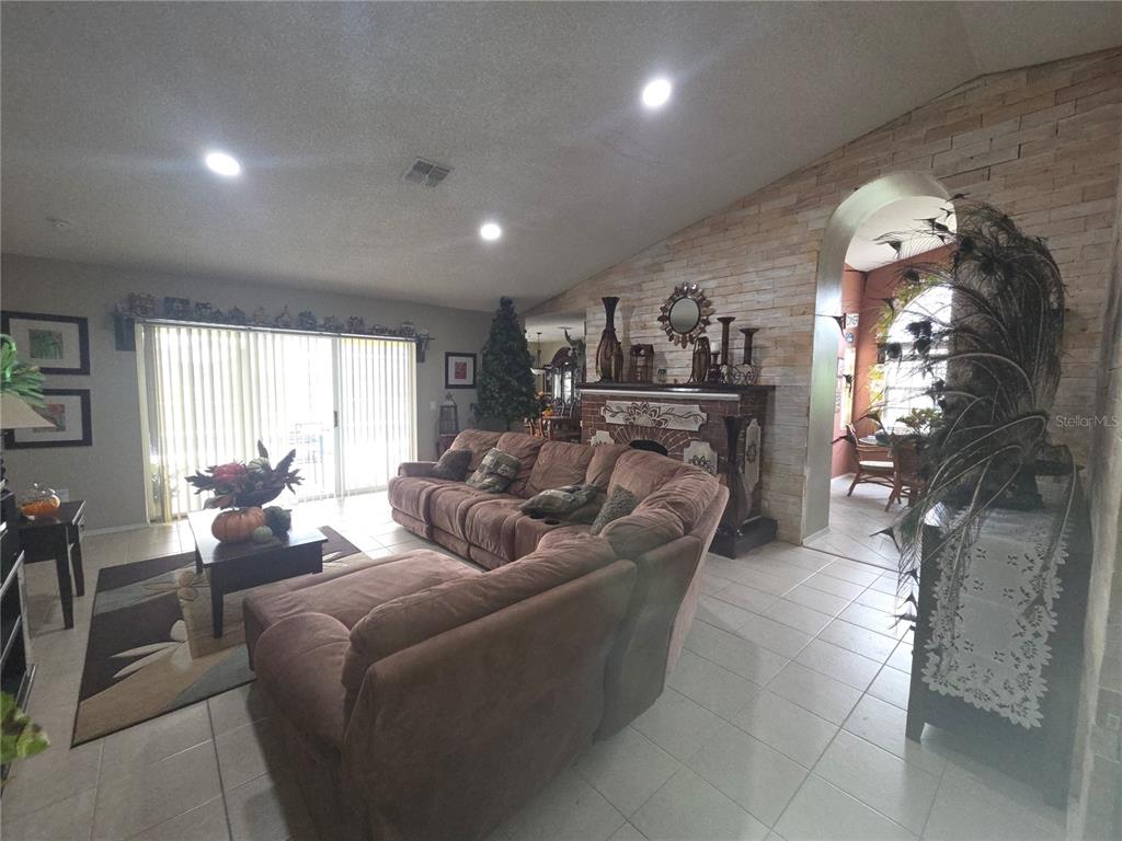 567 Silver Course Run Ocala, FL 34472 - Photo 86 of 95 a living room with furniture and a large window