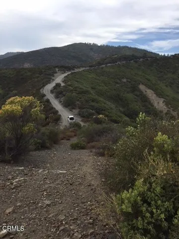 a view of mountain with lake view