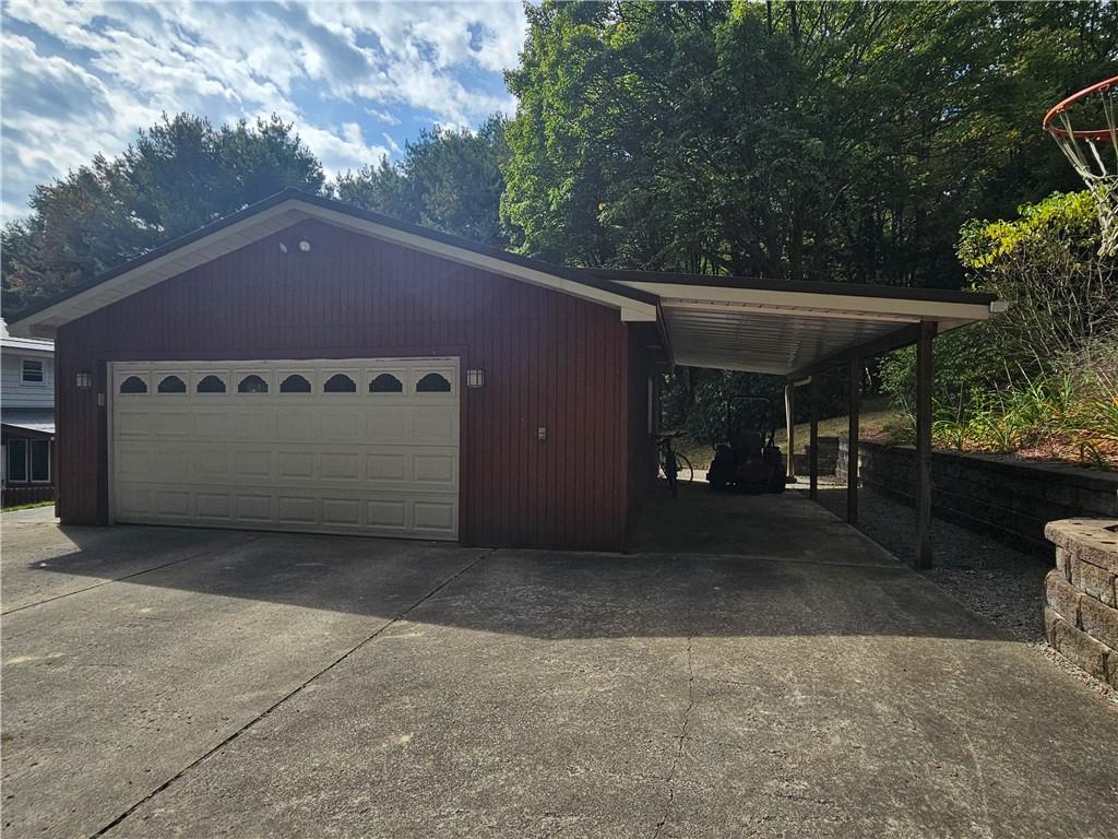 123 Kelly Road Butler, PA 16001 - Photo 3 of 39 2 Car detached garage with carport.
