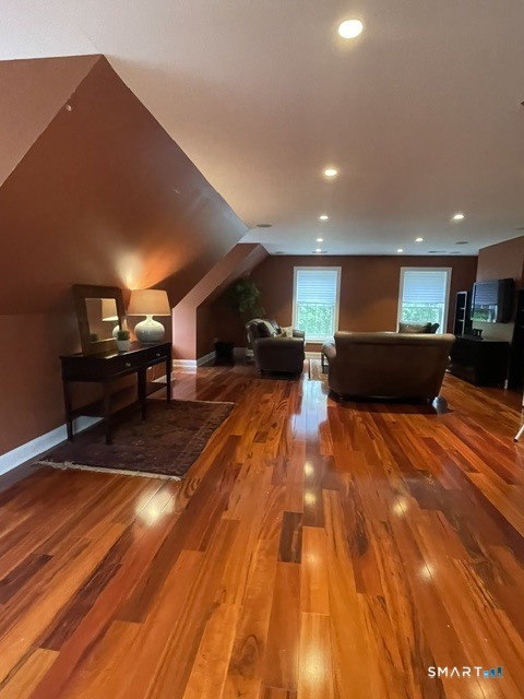 4 Ortense Road Wallingford, CT 06492 - Photo 28 of 33 a view of a patio with dining table and chairs with wooden floor