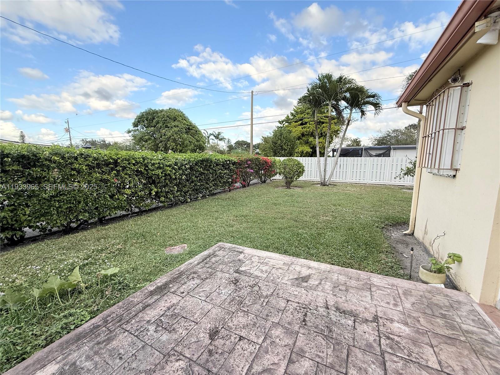 2801 Southwest 92nd Court Miami, FL 33165 - Photo 30 of 32 Yard from Carport side