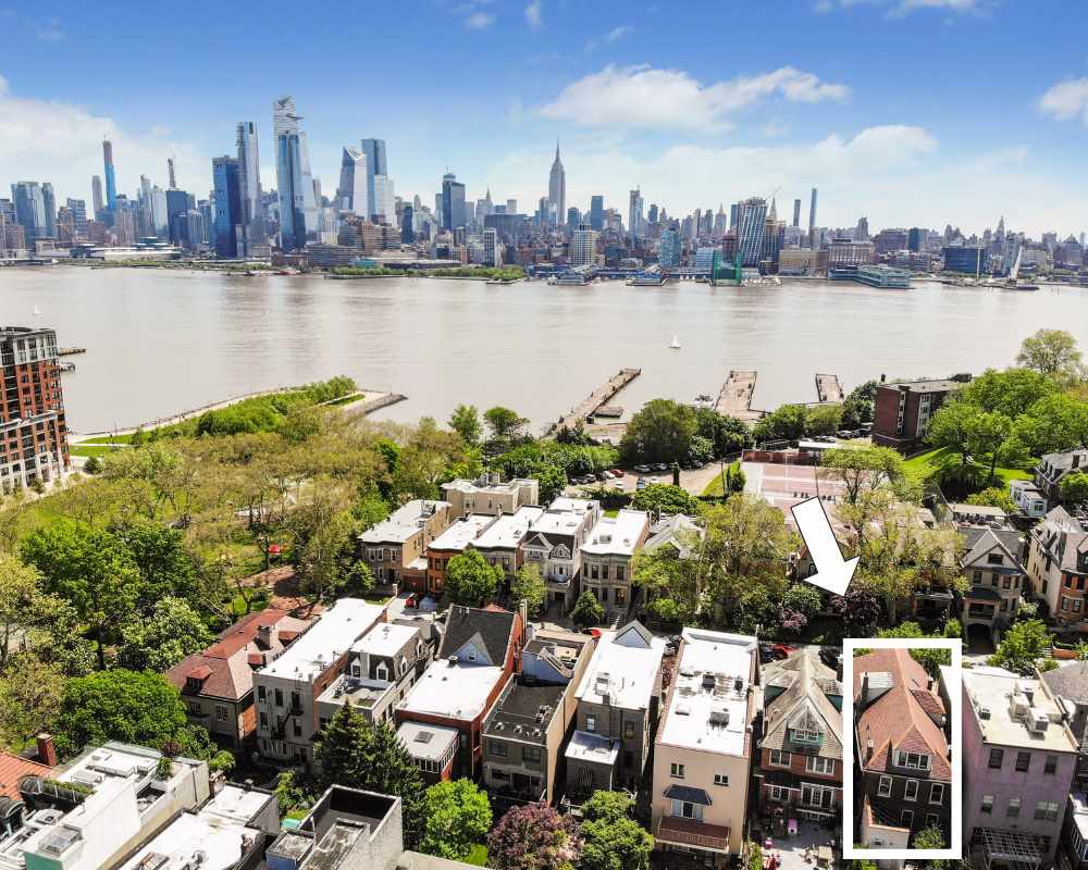 910 Castle Point Terrace Hoboken, NJ 07030 - Photo 1 of 1 a picture of a city with a lake view