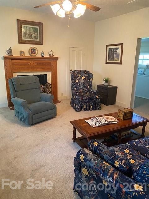 115 Amble Road Olin, NC 28660 - Photo 2 of 47 a living room with furniture and a fireplace