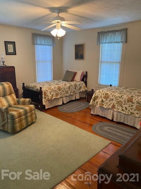 115 Amble Road Olin, NC 28660 - Photo 11 of 47 a bedroom with bed and window