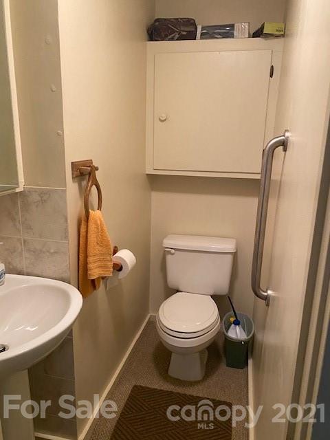 115 Amble Road Olin, NC 28660 - Photo 24 of 47 a bathroom with a toilet and a sink