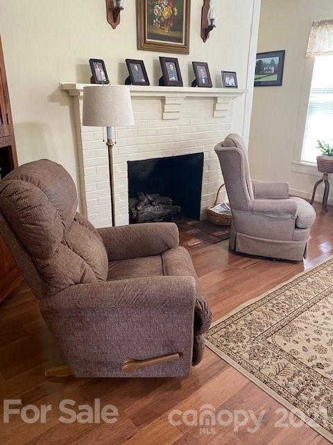 115 Amble Road Olin, NC 28660 - Photo 26 of 47 a living room with furniture and a fireplace