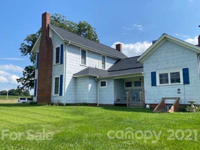 115 Amble Road Olin, NC 28660 - Photo 38 of 47 a view of a house with garden