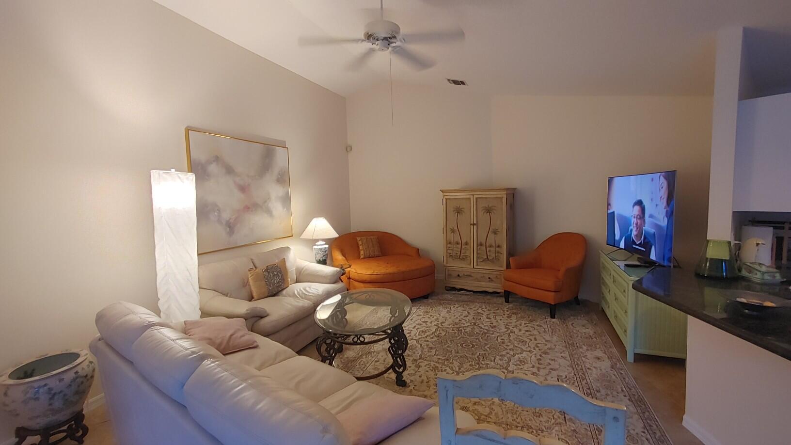 16461 Riverwind Drive Jupiter, FL 33477 - Photo 13 of 45 a bedroom with furniture and a bed