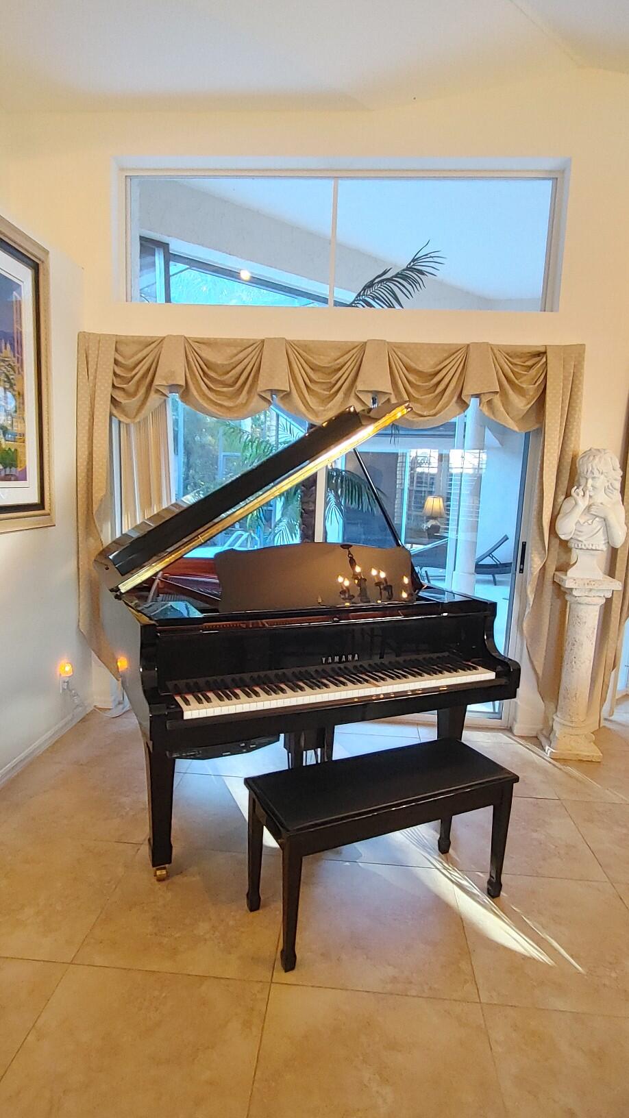 16461 Riverwind Drive Jupiter, FL 33477 - Photo 8 of 45 a sitting area with wooden floor