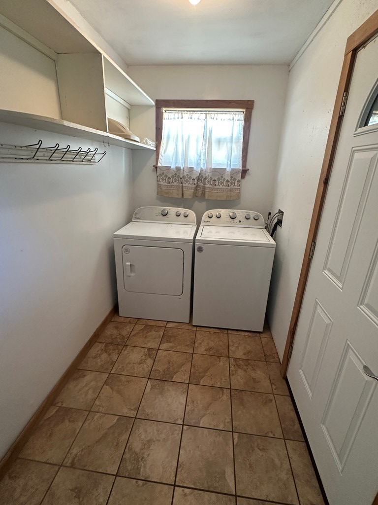104 South Ave B Mason, TX 76856 - Photo 15 of 26 a utility room with dryer and washer