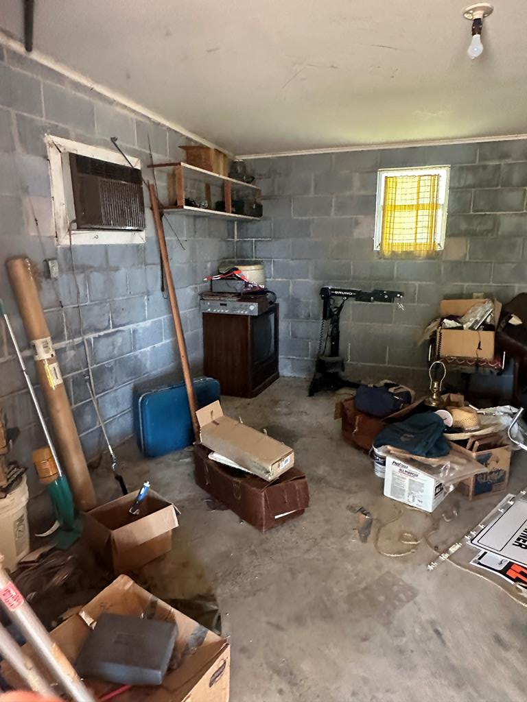 104 South Ave B Mason, TX 76856 - Photo 22 of 26 a living room with furniture and a mirror