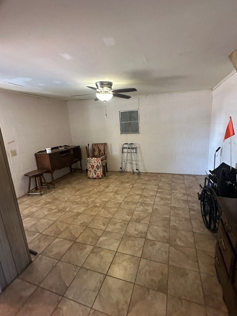 104 South Ave B Mason, TX 76856 - Photo 9 of 26 a living room with furniture and a chandelier