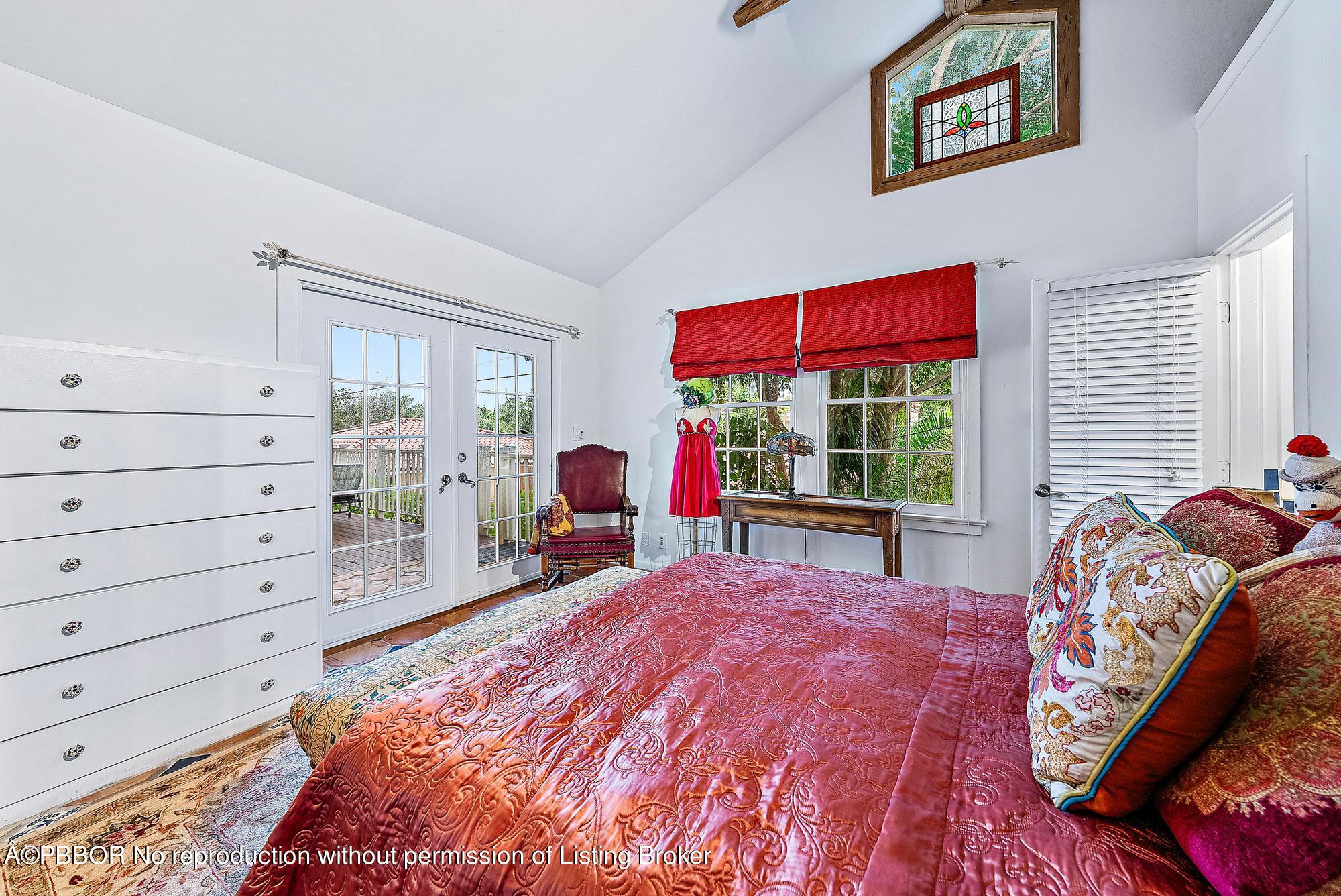 3609 Washington Road West Palm Beach, FL 33405 - Photo 16 of 33 a bed room with a bed and a window
