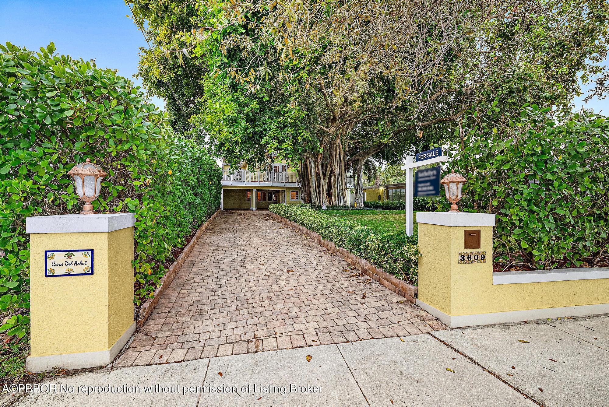3609 Washington Road West Palm Beach, FL 33405 - Photo 2 of 33 front view of a house with a yard