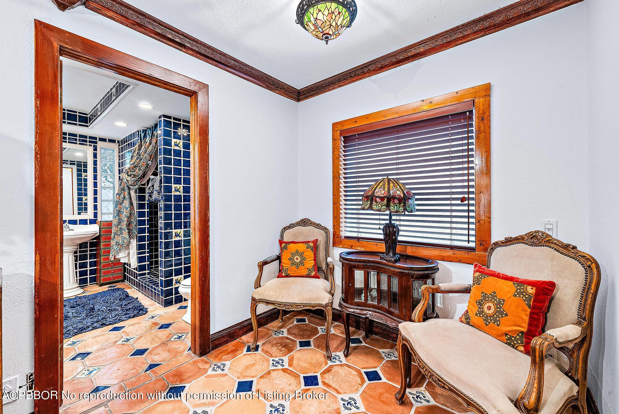3609 Washington Road West Palm Beach, FL 33405 - Photo 24 of 33 a living room with furniture a rug and a window